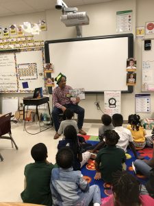 Man reading to Classroom