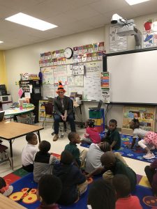 Man reading to Classroom