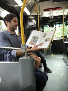 Author reading on the Storybus